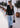 Chaleco Monike con lurex negro